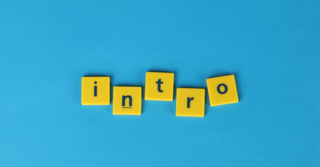 Yellow letter tiles spell 'intro' on a vibrant blue background, ideal for creative projects.