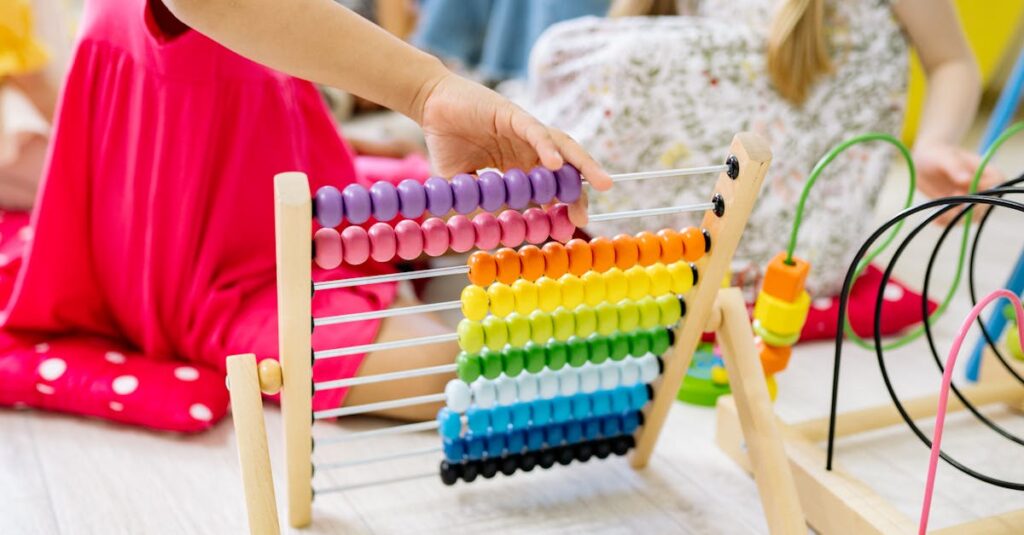 Children actively learning with a colorful abacus in a preschool setting, enhancing educational fun.